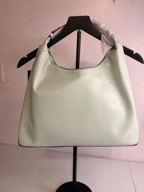 Donna Karan Belmore Hobo Bag Light Mint Green Gold Hardware
Dust Bag